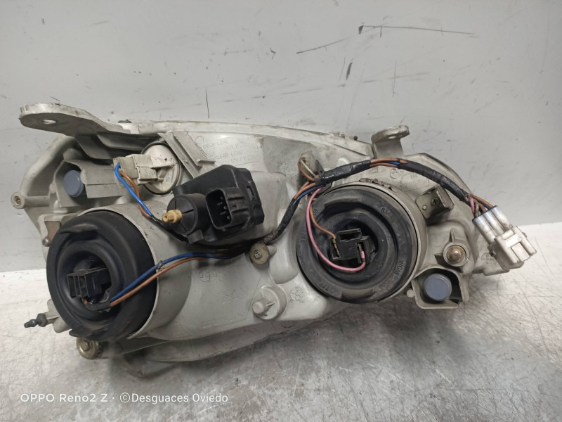 Recambio de faro izquierdo para tata indigo marina 1.4 referencia OEM IAM   