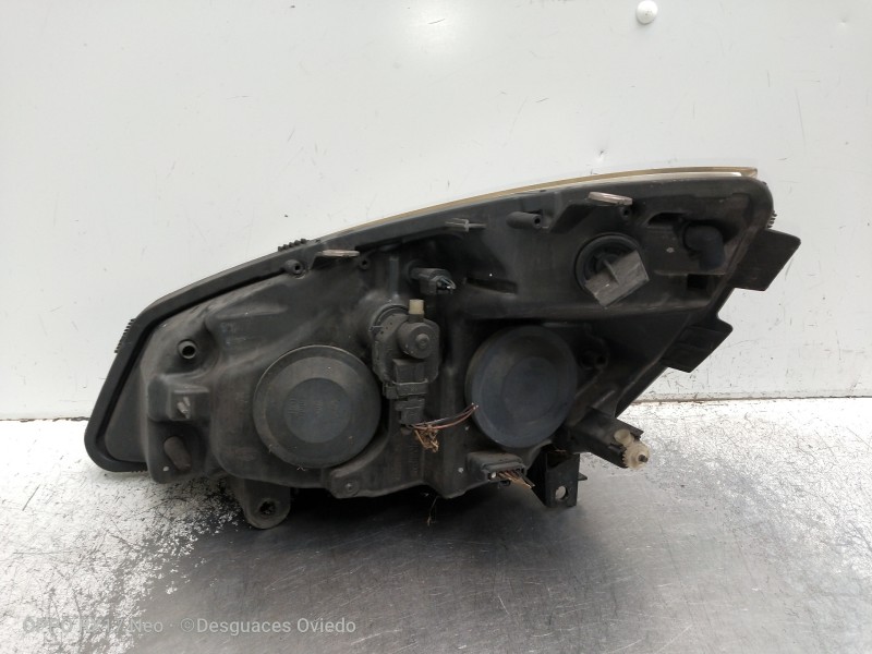 Recambio de faro derecho para renault scenic ii confort dynamique referencia OEM IAM 15810400RE PARA PULIR 
