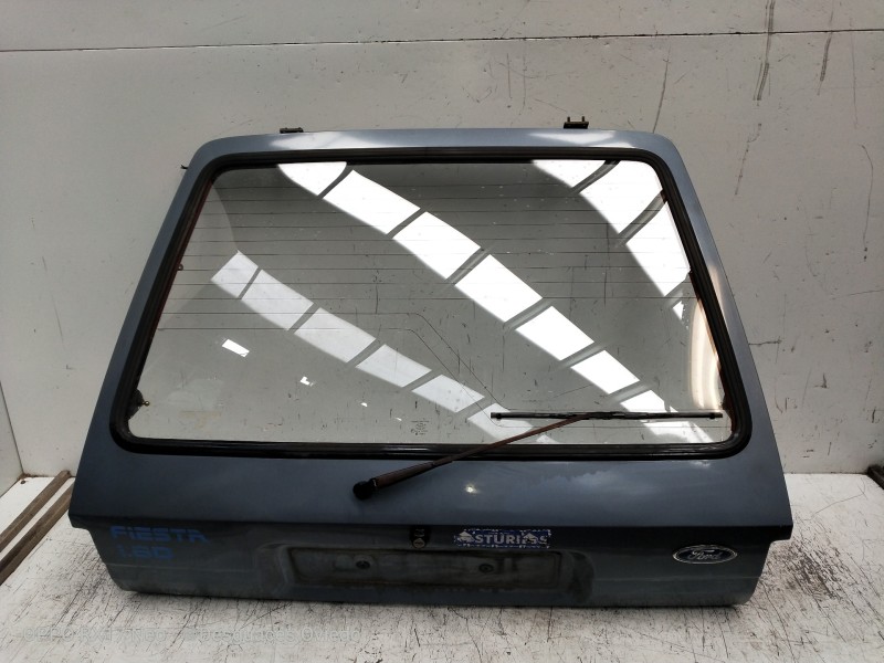 Recambio de porton trasero para ford fiesta berl./express básico referencia OEM IAM VERFOTOS OXIDO 
