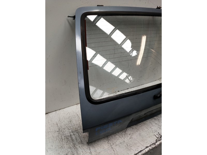 Recambio de porton trasero para ford fiesta berl./express básico referencia OEM IAM VERFOTOS OXIDO 