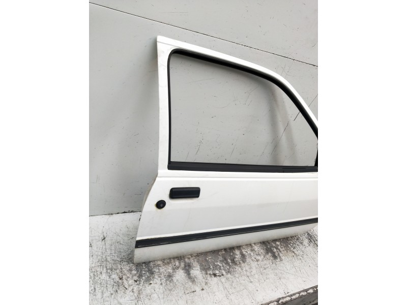 Recambio de puerta delantera izquierda para ford fiesta berl./courier porto referencia OEM IAM   3P