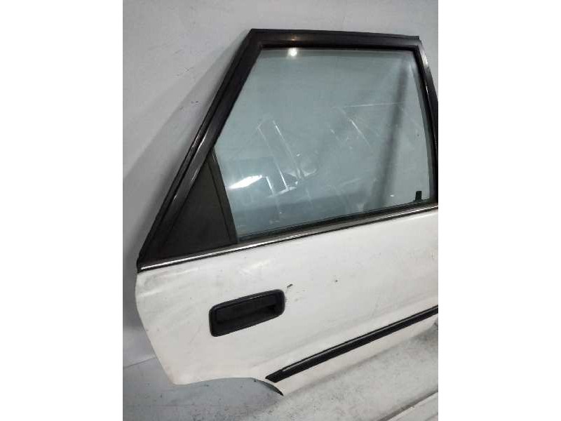 Recambio de puerta trasera derecha para toyota corolla 1.6 referencia OEM IAM   