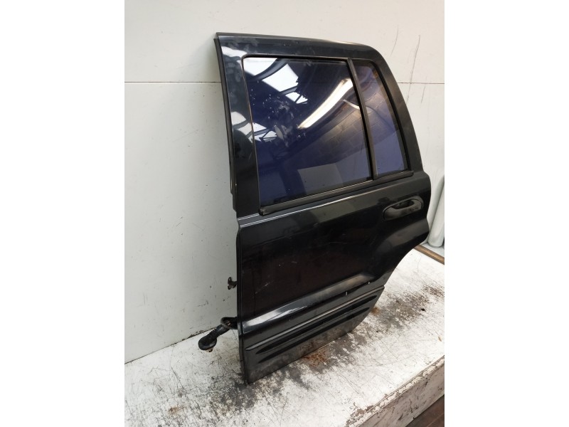 Recambio de puerta trasera izquierda para jeep gr.cherokee (wj/wg) 2.7 crd limited referencia OEM IAM   5P