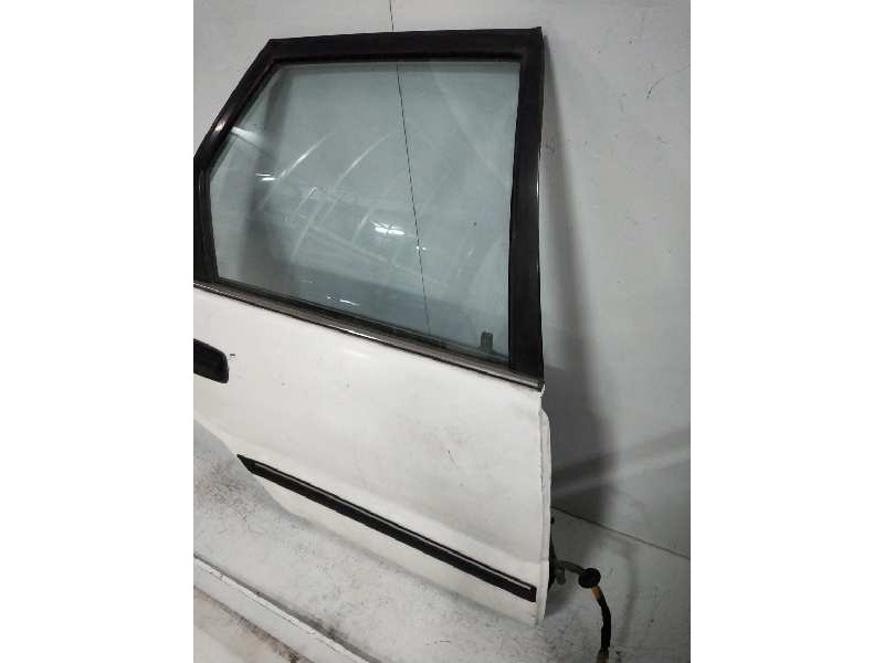 Recambio de puerta trasera derecha para toyota corolla 1.6 referencia OEM IAM   