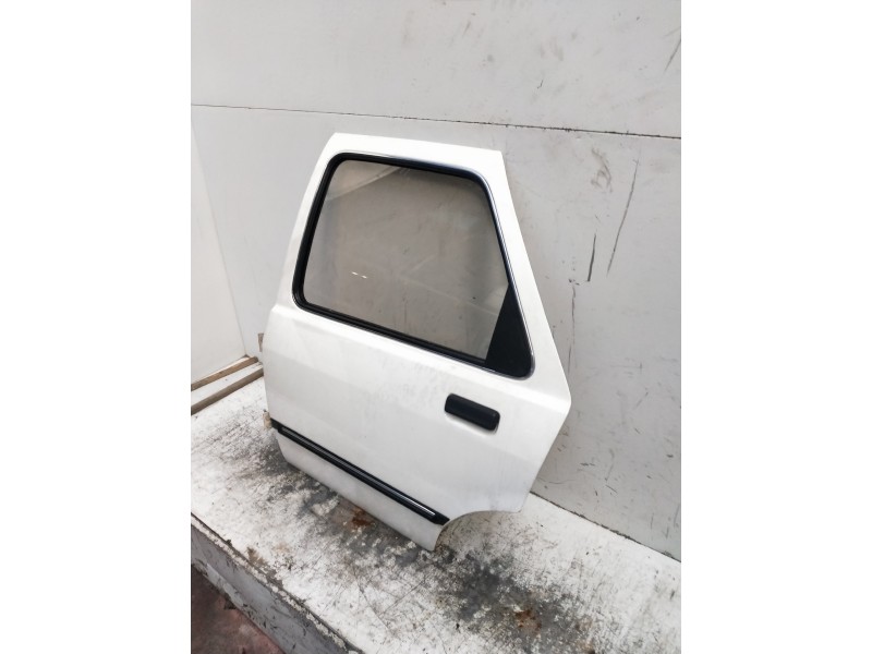 Recambio de puerta trasera izquierda para ford sierra berlina 1.6 referencia OEM IAM   5P