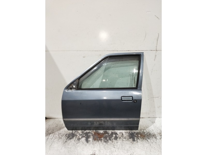 Recambio de puerta delantera izquierda para ford escort berlina referencia OEM IAM   