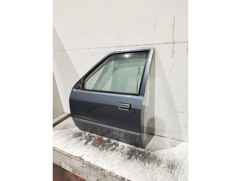 Recambio de puerta delantera izquierda para ford escort berlina referencia OEM IAM   