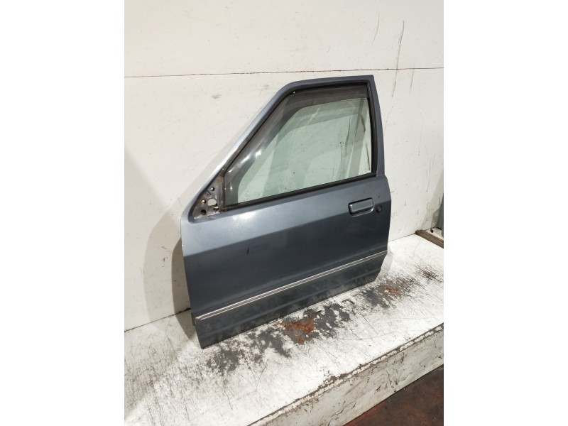 Recambio de puerta delantera izquierda para ford escort berlina referencia OEM IAM   