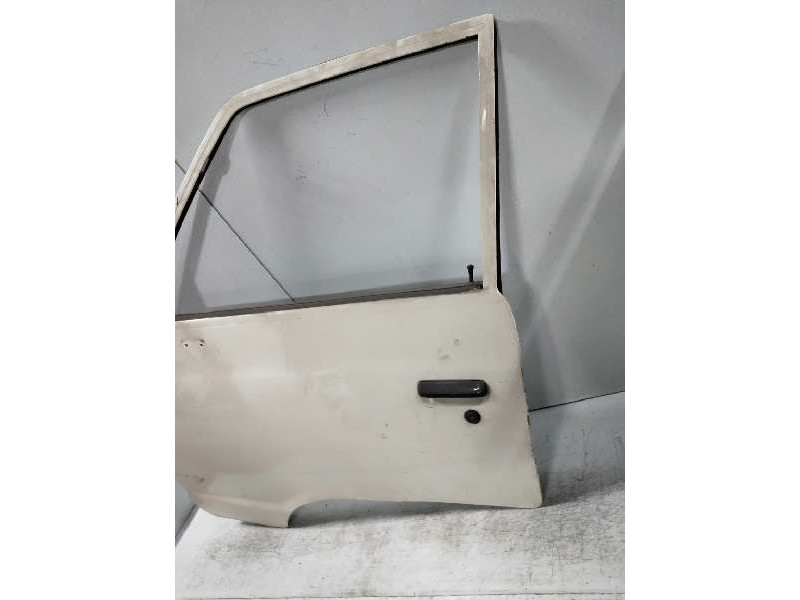 Recambio de puerta delantera izquierda para nissan vanette (c 220) vanette bus referencia OEM IAM   
