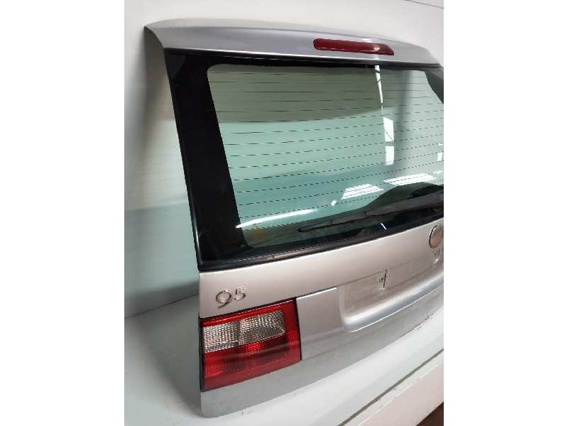 Recambio de porton trasero para saab 9-5 familiar 2.2 tid arc referencia OEM IAM 5185921  