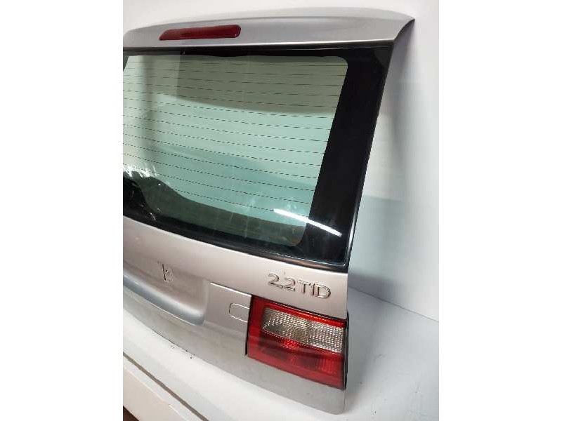 Recambio de porton trasero para saab 9-5 familiar 2.2 tid arc referencia OEM IAM 5185921  