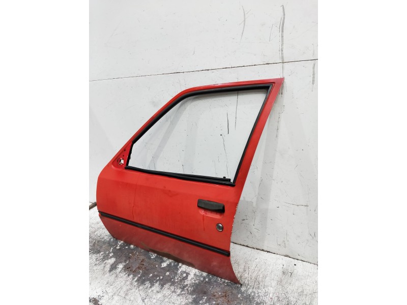Recambio de puerta delantera izquierda para peugeot 205 berlina 1.1 referencia OEM IAM   5P