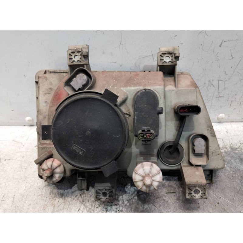 Recambio de faro izquierdo para mitsubishi canter 4.05  chasis 75 cabina individual (comfort) referencia OEM IAM 89311292  