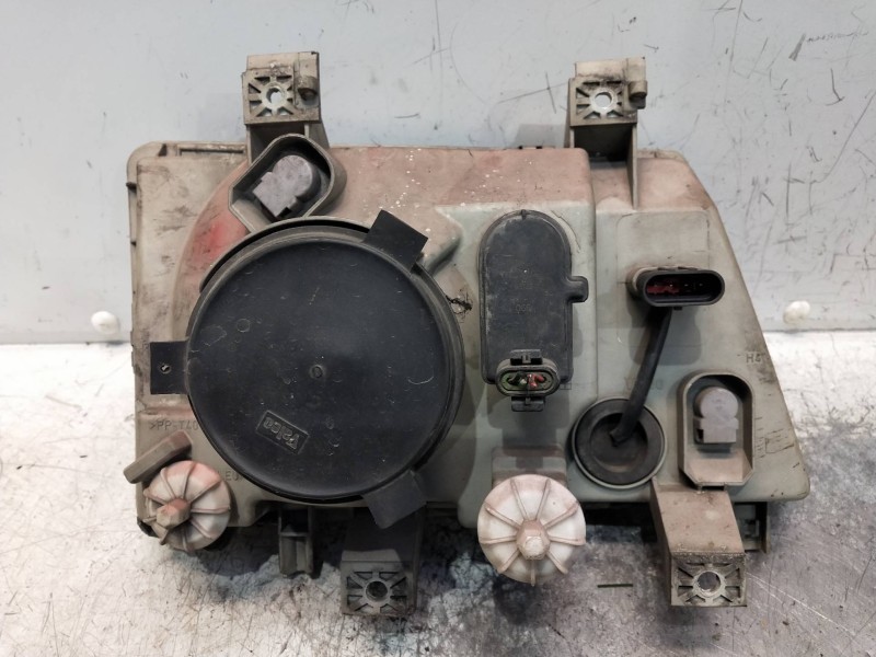 Recambio de faro izquierdo para mitsubishi canter 4.05  chasis 75 cabina individual (comfort) referencia OEM IAM 89311292  