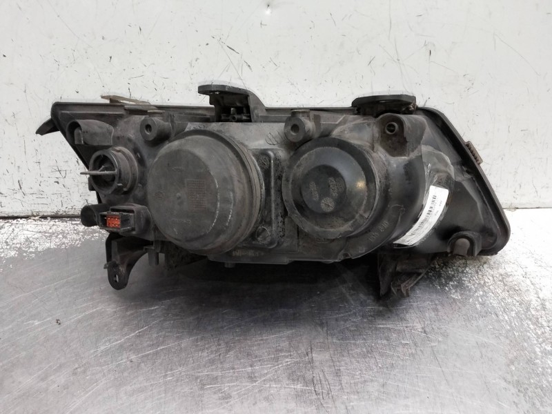 Recambio de faro izquierdo para saab 9-3 sport hatch referencia OEM IAM   