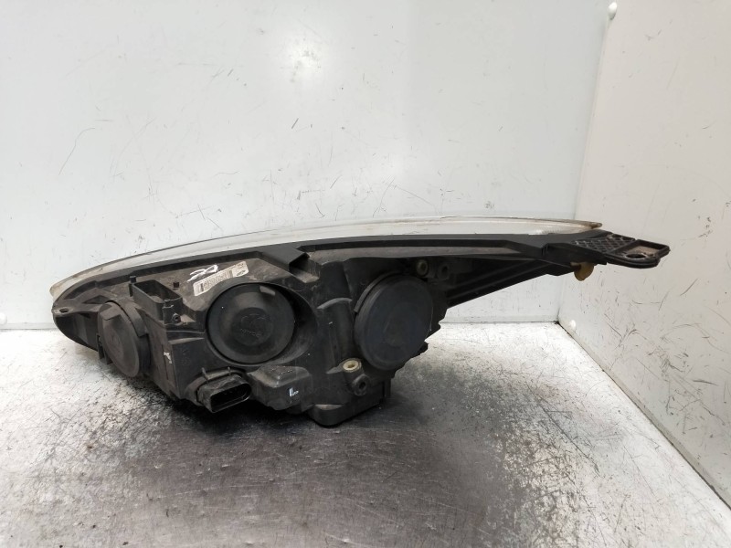 Recambio de faro derecho para ford focus turn. referencia OEM IAM F1EB13W029  
