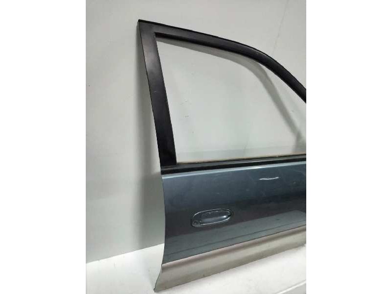 Recambio de puerta delantera derecha para kia carens 1.8 cat referencia OEM IAM   