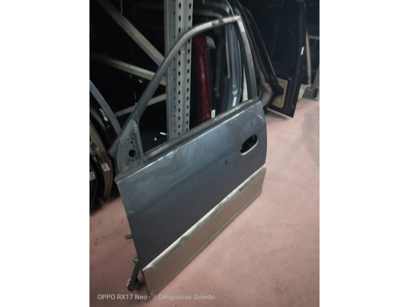 Recambio de puerta delantera izquierda para kia carens 1.8 cat referencia OEM IAM   