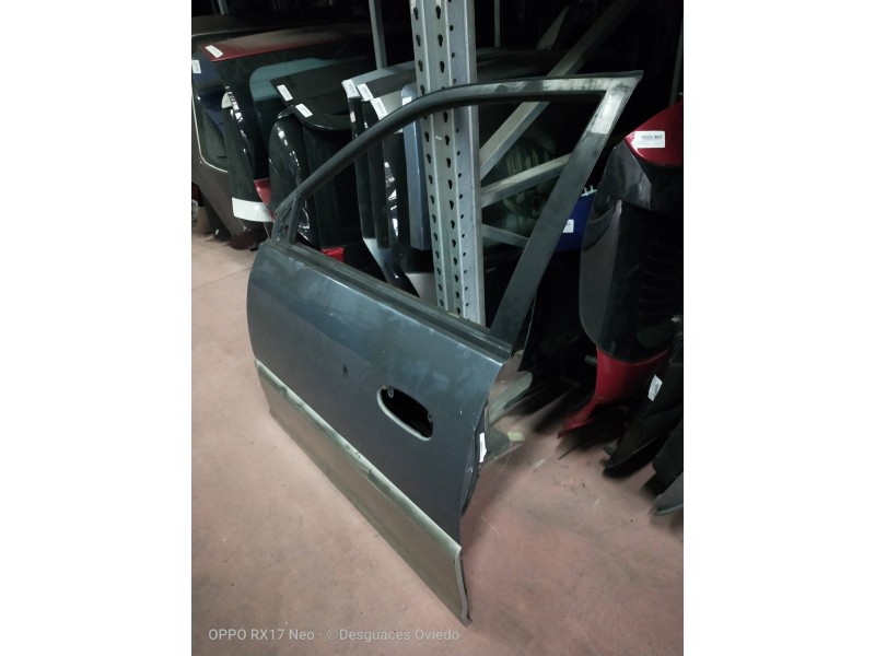 Recambio de puerta delantera izquierda para kia carens 1.8 cat referencia OEM IAM   