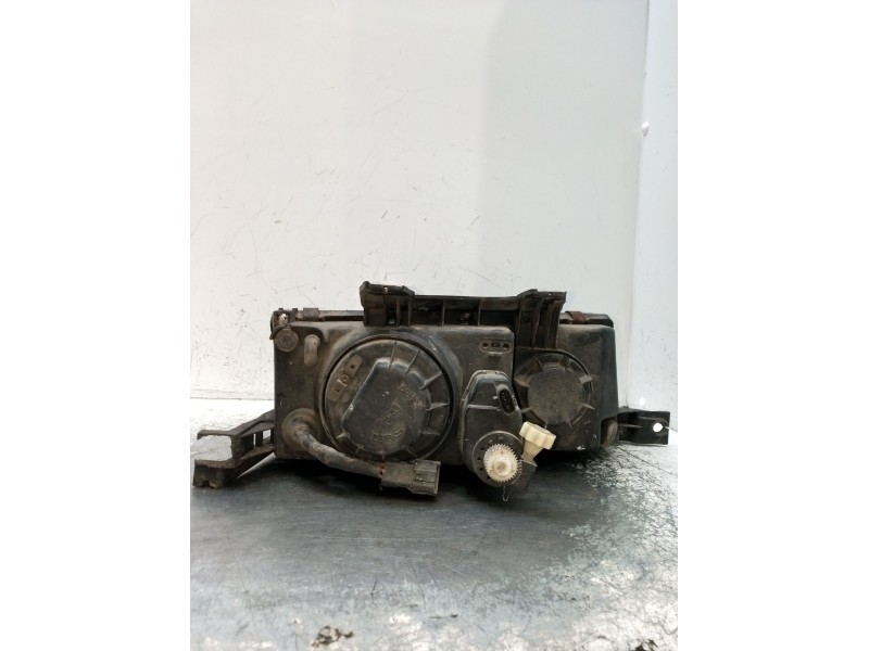 Recambio de faro izquierdo para ssangyong musso (fj) 2.9 d referencia OEM IAM   