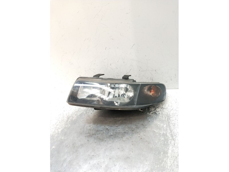Recambio de faro izquierdo para seat leon (1m1) 1.9 tdi referencia OEM IAM 97742699  